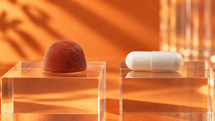 A fruit gummy beside a capsule for a format comparison